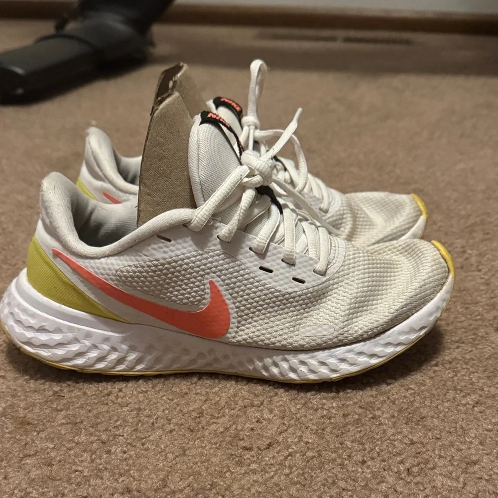 Nike White and Pink Sneakers with Yellow Accents